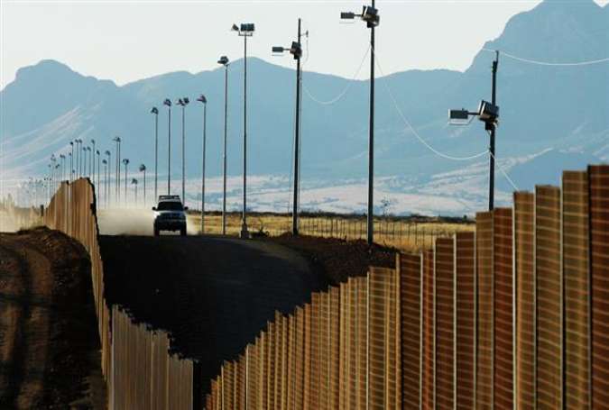 A fence at US-Mexico border near Naco, Mexico
