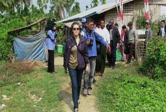 UN Special Rapporteur on Myanmar Yanghee Lee (center) visits a site in Rakhine state, Myanmar, January 9.
