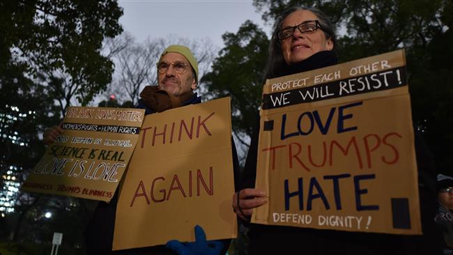 People stage a demonstration in protest at Trump's inauguration Trump in Tokyo, Japan, on January 20, 2017.