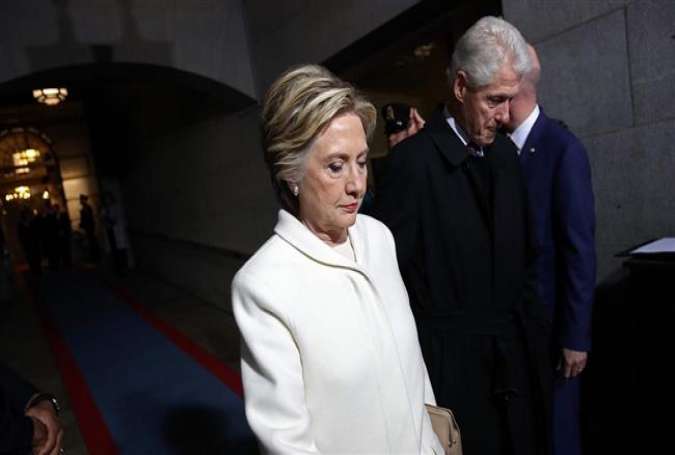 Former Democratic presidential nominee Hillary Clinton and former President Bill Clinton arrive on the West Front of the US Capitol on January 20, 2017 in Washington, DC.