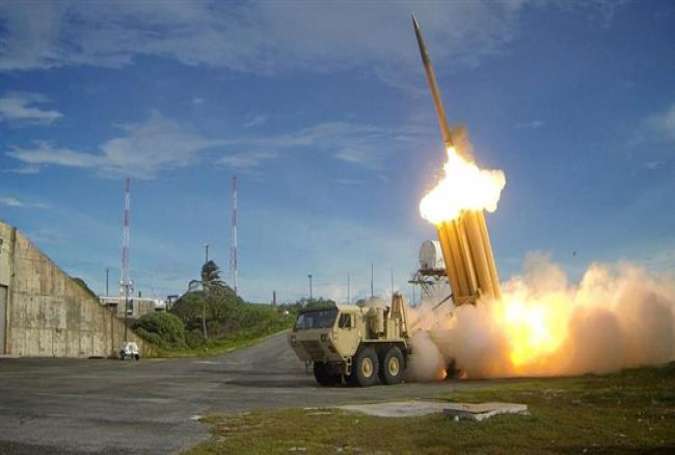 A Terminal High Altitude Area Defense (THAAD) interceptor is launched during a test in an undisclosed location, September 10, 2013.