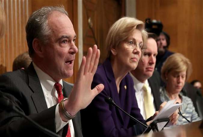 US Democratic Senators Tim Kaine (left), Chris Murphy (2nd-right) and Elizabeth Warren (3rd-right)