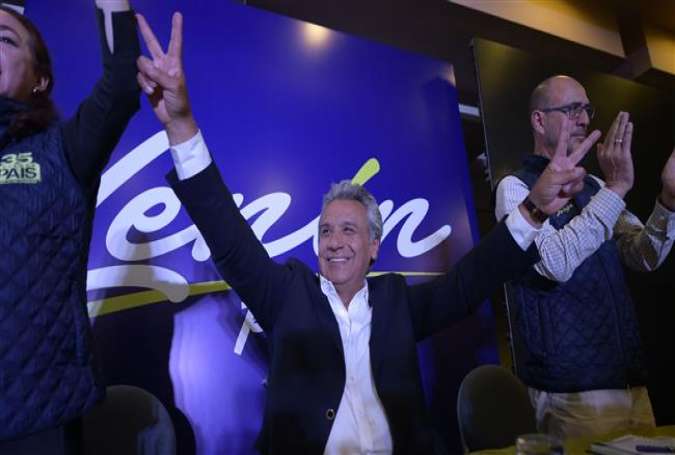 Lenin Moreno, the presidential candidate of the governing party in Ecuador, flashes the victory sign to supporters at a hotel in Quito, Ecuador, February 19, 2017.