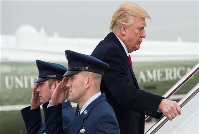 US President Donald Trump boards Air Force One at Andrews Air Force Base in Maryland on February 17, 2017 as he departs to attend the unveiling of the Boeing 787-10 Dreamliner in North Charleston, South Carolina.