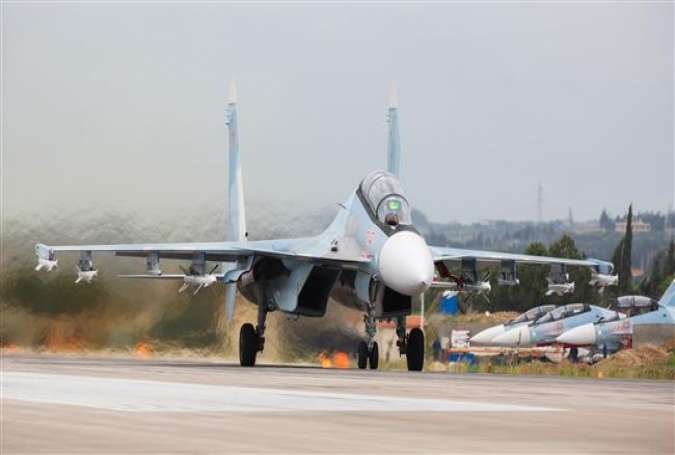 In this photo provided by the Russian Defense Ministry Press Service, a Russian Su-30 fighter jet takes off at Hmeimim Air Base in Syria on March 16, 2016.