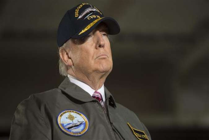 US President Donald Trump arrives to speak aboard the pre-commissioned USS Gerald R. Ford aircraft carrier in Newport News, Virginia, March 2, 2017.