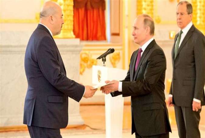 Israeli Ambassador to Moscow Gary Koren (L) presents his credentials to Russian President Vladimir Putin at the Kremlin on March 16, 2017.