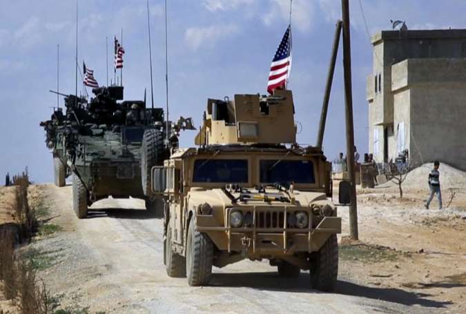 U.S. forces patrol on the outskirts of the Syrian town, Manbij, a flashpoint between Turkish troops and allied Syrian fighters and U.S.-backed Kurdish fighters, in al-Asaliyah village, Aleppo province, Syria, March 7, 2017.