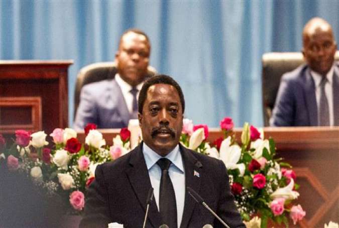 Congolese President Joseph Kabila delivers a speech to the nation in front of the upper and lower chambers at the Palace of the People in Kinshasa on April 5, 2017. (Photo by AFP)