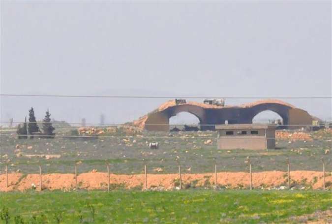 A view of the damaged Shayrat airfield at the Syrian government forces military base targeted earlier by US Tomahawk cruise missiles, southeast of the central and third largest Syrian city of Homs, April 7, 2017. (Photo by AFP)