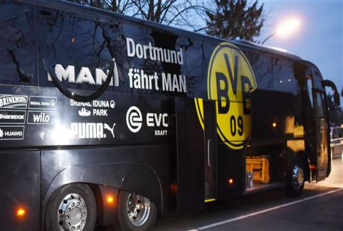 Explosions in front of Borussia Dortmund team bus leave one injured