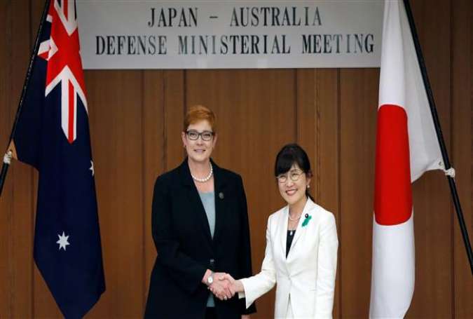 Australian Defense Minister Marise Payne (L) meets with her Japanese counterpart Tomomi Inada ahead of a 2+2 meeting with foreign ministers of the two countries, at the Defense Ministry in Tokyo, Japan, April 19, 2017. (Photo by AFP)