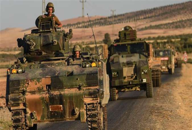 This file photo taken on September 02, 2016 shows Turkish soldiers driving back to Turkey from the Syrian-Turkish border town of Jarabulus. (Photos by AFP)