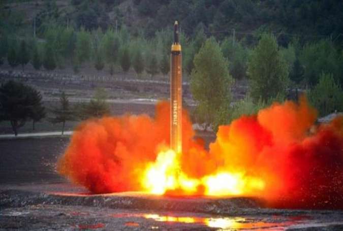 The long-range strategic ballistic rocket Hwasong-12 (Mars-12) is launched during a test in this undated photo released by North Korea