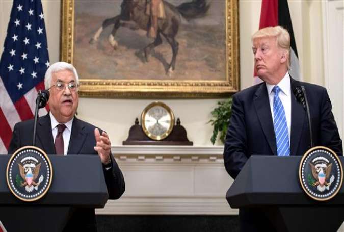 Palestinian President Mahmoud Abbas (L) speaks in a joint press conference with his US counterpart, Donald Trump, at the White House in Washington on May 3, 2017. (Photo by AFP)