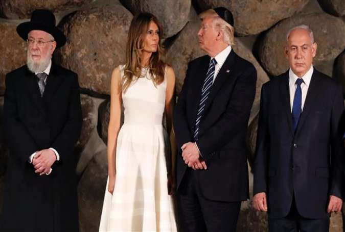 (From L-R) Rabbi Yisrael Meir Lau, First Lady Melania Trump, US President Donald Trump and Israel Prime Minister Benjamin Netanyahu attend a wreath laying ceremony during a visit to the Yad Vashem Holocaust Memorial museum on May 23, 2017, in Jerusalem al-Quds.