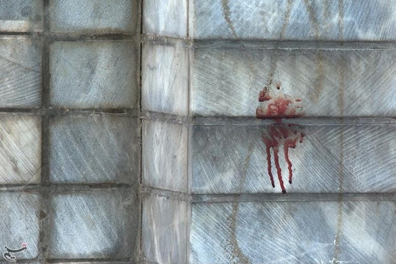 Blood is seen at the scene of an attack on the Iranian parliament in central Tehran, Iran.