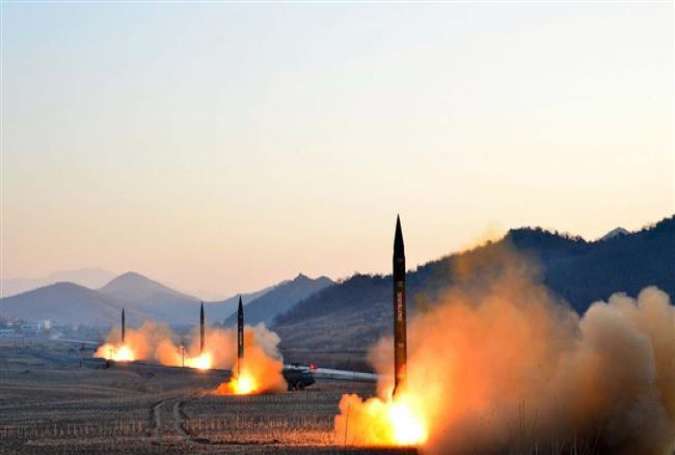 This photograph distributed by North Korea’s state news agency shows the launch of four ballistic missiles. (File photo by Korean Central News Agency)