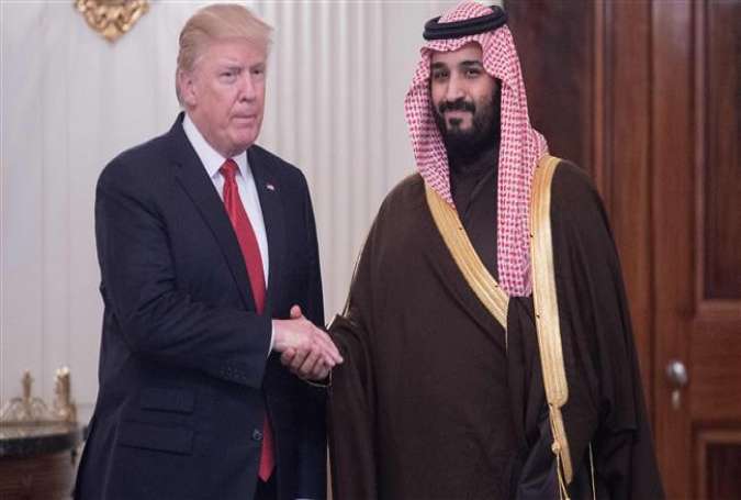 This AFP file photo taken on March 14, 2017 shows US President Donald Trump and then-Saudi Deputy Crown Prince Mohammed bin Salman in the State Dining Room before lunch at the White House in Washington, DC.