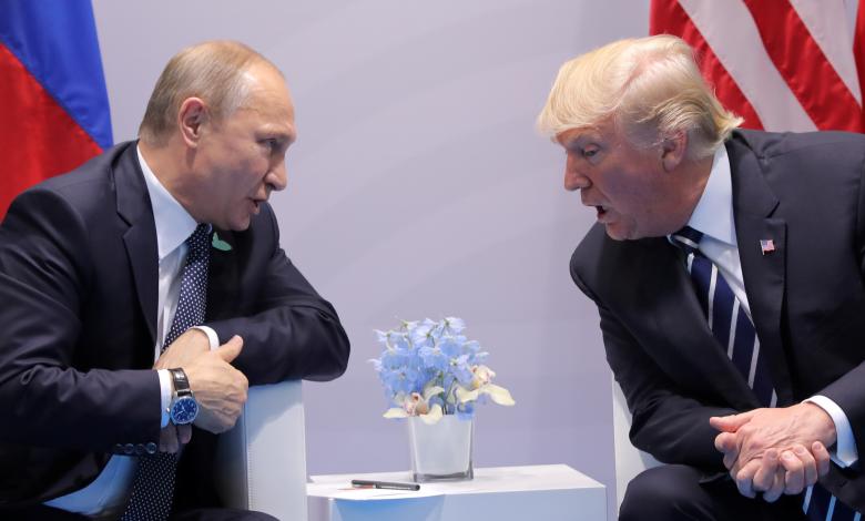 U.S. President Donald Trump speaks with Russian President Vladimir Putin during their bilateral meeting.