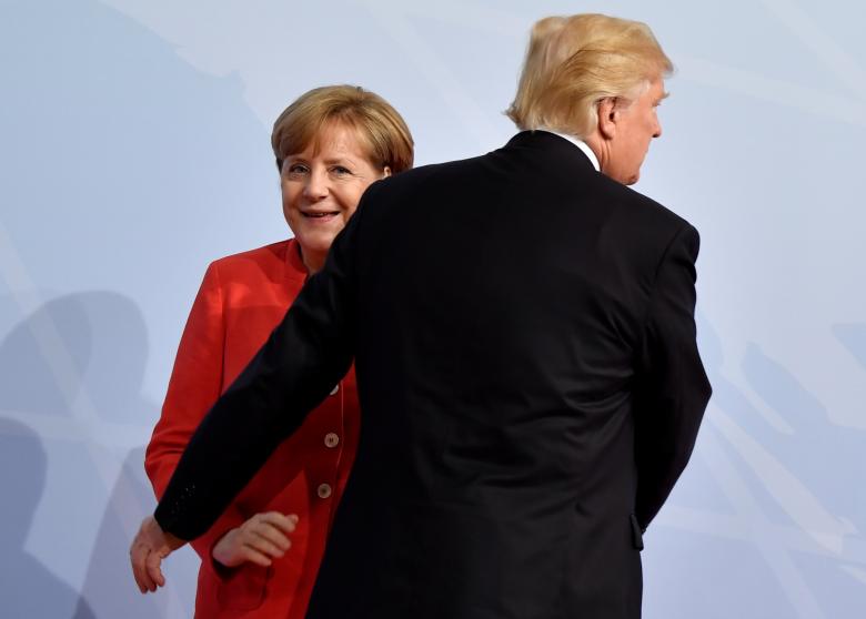 German Chancellor Angela Merkel greets U.S. President Donald Trump.