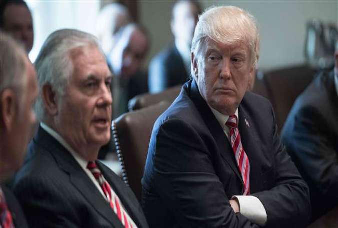 US President Donald Trump (R) listens to Secretary of State Rex Tillerson during a cabinet meeting in Washington, DC, on June 12, 2017. (Photo by AFP)