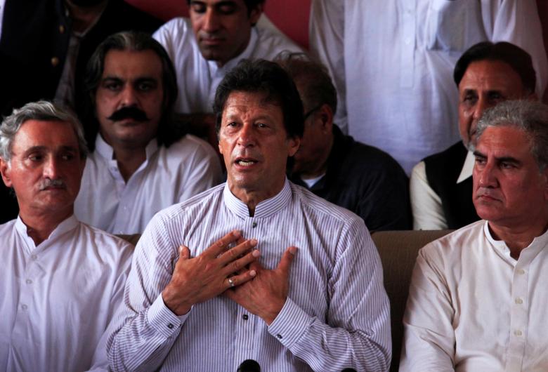 Opposition leader Imran Khan addresses a news conference after the Supreme Court's decision to disqualify Prime Minister Nawaz Sharif in Islamabad.