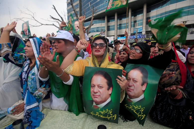 Supporters of Pakistan's Prime Minister Nawaz Sharif react after the Supreme Court's decision to disqualify Sharif, in Lahore.