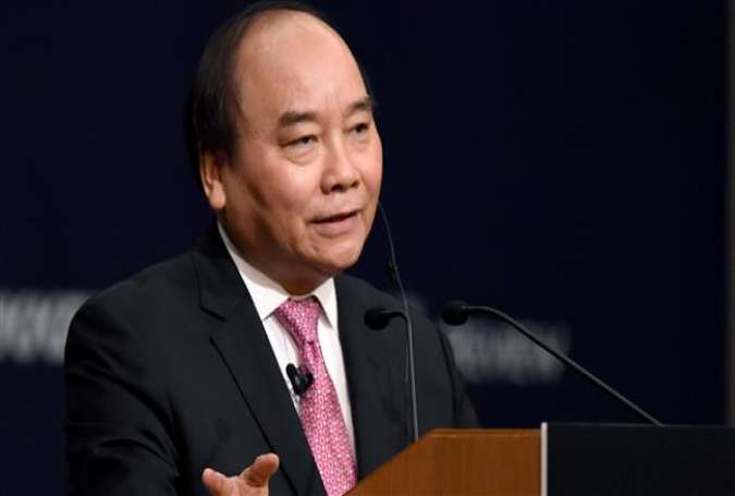 Vietnamese Prime Minister Nguyen Xuan Phuc answers questions during an international conference in Tokyo on June 5, 2017. (Photo by AFP)