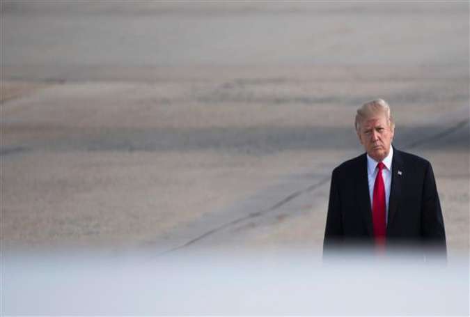 US President Donald Trump walks to Air Force One at Andrews Air Force Base, MD, on July 22, 2017. (Photo by AFP)