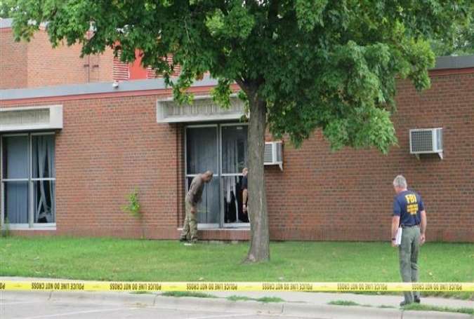 FBI agents and others inspect the site where an explosion happened at the Dar al-Farooq Islamic Center in Bloomington, Minnesota, on August 5, 2017. (Photo via MPR News)