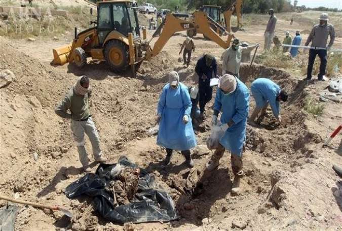 Forensic teams exhuming more remains at mass graves in Iraq’s Tikrit