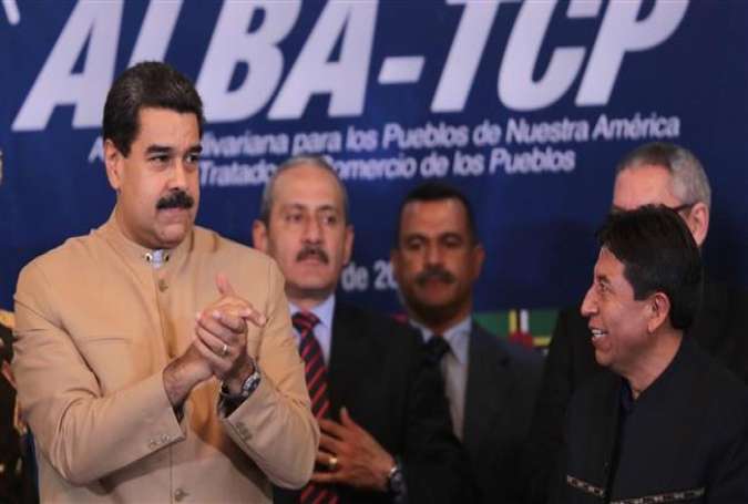 Venezuelan President Nicolas Maduro (L) hosts a Bolivarian Alliance for the Peoples of Our America (ALBA) meeting in the capital, Caracas, on August 8, 2017. (Photo by AFP)