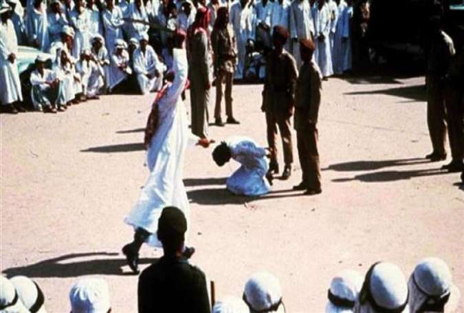 The file photo shows a public beheading in Saudi Arabia.