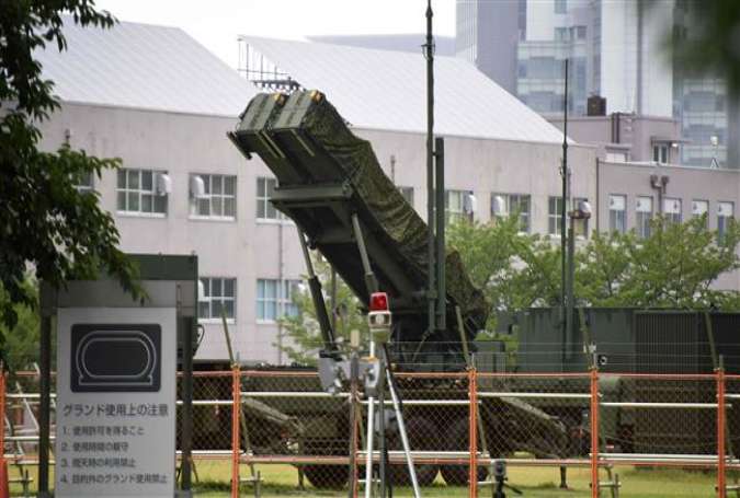 A Patriot Advanced Capability-3 (PAC-3) missile interceptor belonging to the Japanese military is deployed outside the Defense Ministry headquarters in Tokyo on August 11, 2017. (Photo by AFP)