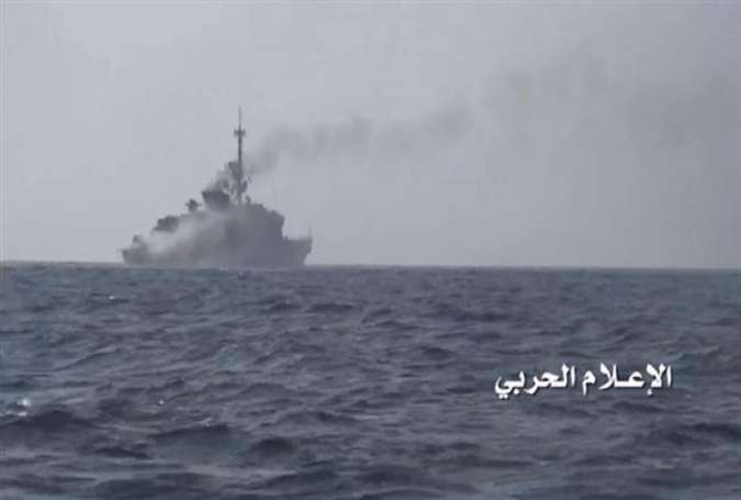 Smoke rises from al-Madinah warship in waters near the city of Hudaydah, Yemen, on January 30, 2017 after Yemeni army forces, backed by fighters from allied Popular Committees, fired a guided missile at it.