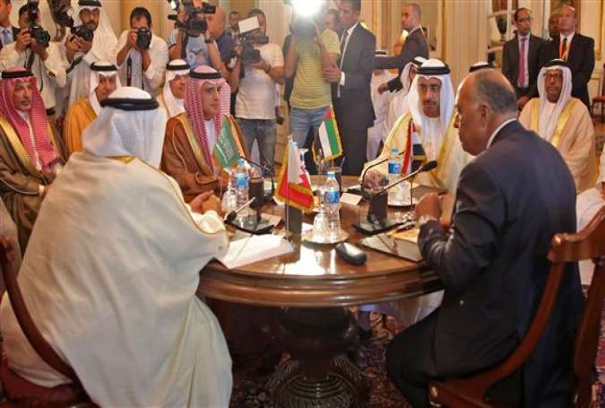 Bahraini Foreign Minister Khalid bin Ahmed al-Khalifa (L), Saudi Foreign Minister Adel al-Jubeir (2nd-L), UAE Minister of Foreign Affairs and International Cooperation Abdullah bin Zayed Al-Nahyan (2nd-R), and Egyptian Foreign Minister Sameh Shoukry (R) meet in Cairo on July 5, 2017. (Photo by AFP)