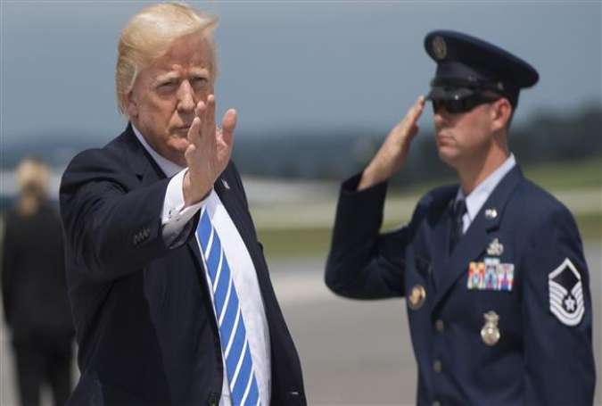 US President Donald Trump disembarks from Air Force One upon arrival at Hagerstown Regional Airport in Maryland on August 18, 2017, as he travels for meetings at Camp David before returning to Bedminster, New Jersey to continue his vacation. (Photo by AFP)