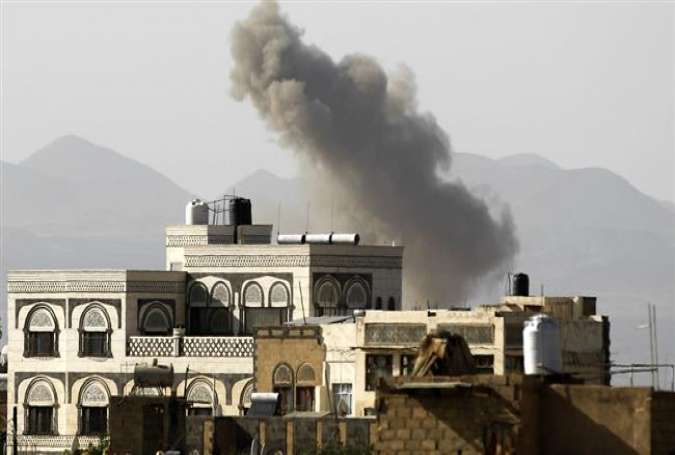 Smoke billows from buildings following a Saudi airstike in the Yemeni capital, Sana