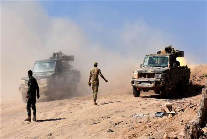 Syrian forces begin their advance on the area of Bughayliyah, on the northern outskirts of Dayr al-Zawr in northwestern Syria on September 13, 2017. (Photo by AFP)