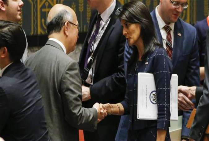 (L to R) Koro Bessho, Japanese Ambassador to the United Nations, shakes hands with Nikki Haley, United States Ambassador to the United Nations, at the conclusion of a meeting of the United Nations Security Council concerning North Korea at UN headquarters, September 11, 2017 in New York City.