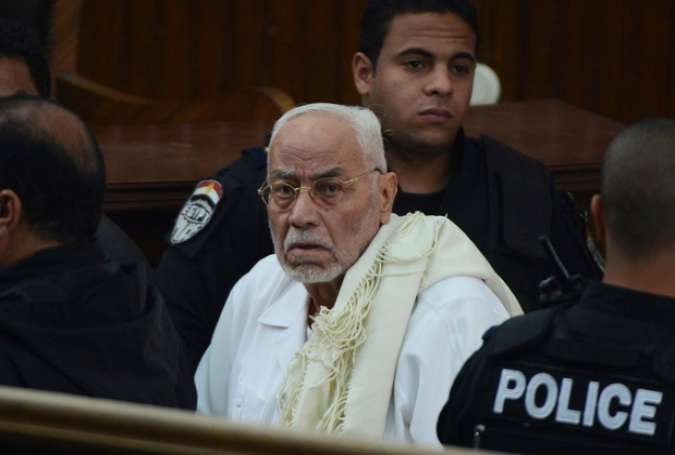 Mohammed Mahdi Akef looks on during his trial in Cairo