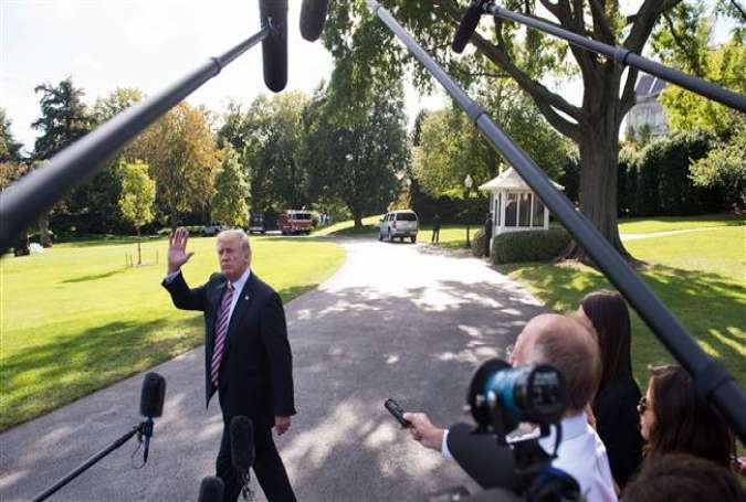 US President Donald Trump speaks to the media prior to boarding Marine One and departing from the South Lawn of the White House in Washington, DC, September 29, 2017, as travels to spend the weekend at his golf course in Bedminster, New Jersey. (Photo by AFP)