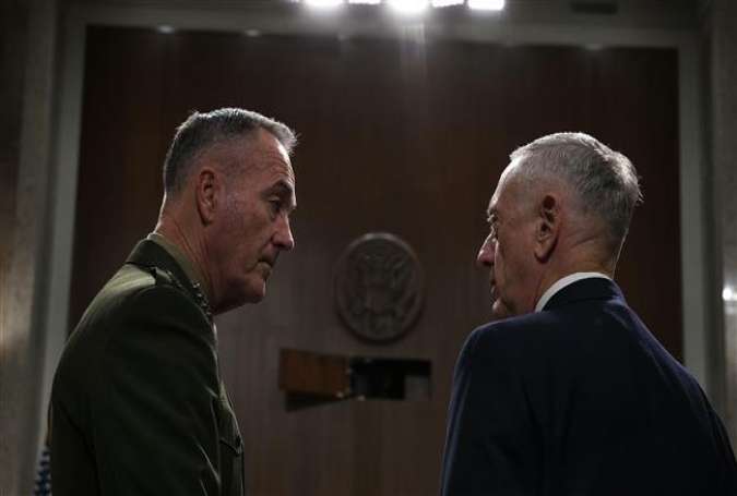 US Secretary of Defense Jim Mattis (R) and Chairman of the Joint Chiefs of Staff General Joseph Dunford wait for the beginning of a hearing before the Senate Armed Services Committee in Washington, DC, October 3, 2017. (Photo by AFP)
