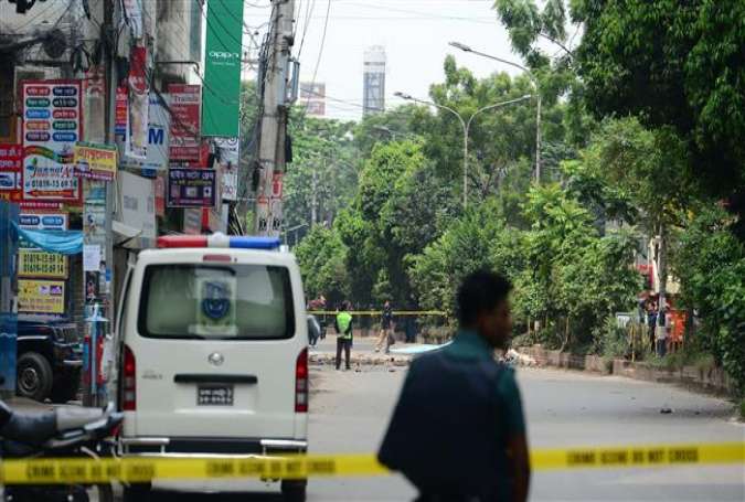 Bangladesh police secure the area after a raid in the capital Dhaka on August 15, 2017. (Photo by AFP)