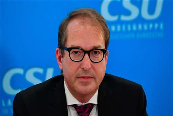 German Transport Minister Alexander Dobrindt of the Christian Social Union (CSU) party gives a press conference on September 26, 2017 in Berlin, two days after general elections. (Photo by AFP)