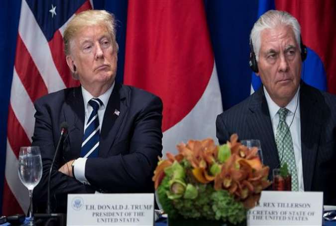 This AFP file photo taken on September 21, 2017 shows US President Donald Trump (L) and US Secretary of State Rex Tillerson listening to statements before a luncheon with US, Korean, and Japanese leaders at the Palace Hotel during the 72nd United Nations General Assembly in New York City.