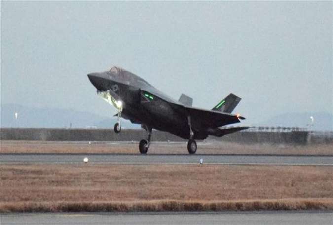 This picture, taken on January 18, 2017, shows a US F-35 stealth fighter jet landing at the US Marine’s Iwakuni Air Station in Iwakuni, Yamaguchi Prefecture, in Japan. (By AFP)