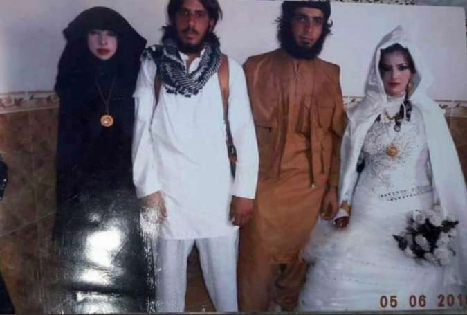 İŞİD-in cihad nikahı köləsi gəlin paltarında (FOTO)
