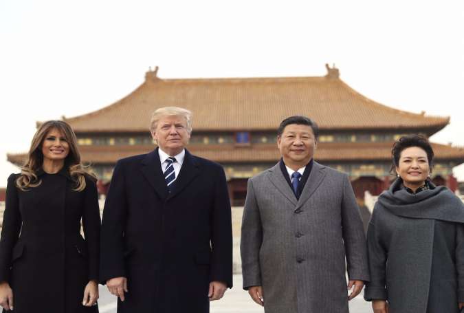 Donald Trump, Xi Jinping, and their wives Melania Trump and Peng Liyuan in Beijing, China.jpg